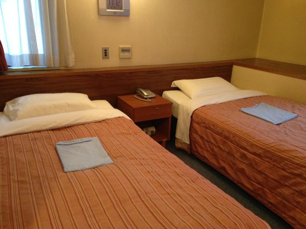 Tourist Hotel Tokio Habitación foto