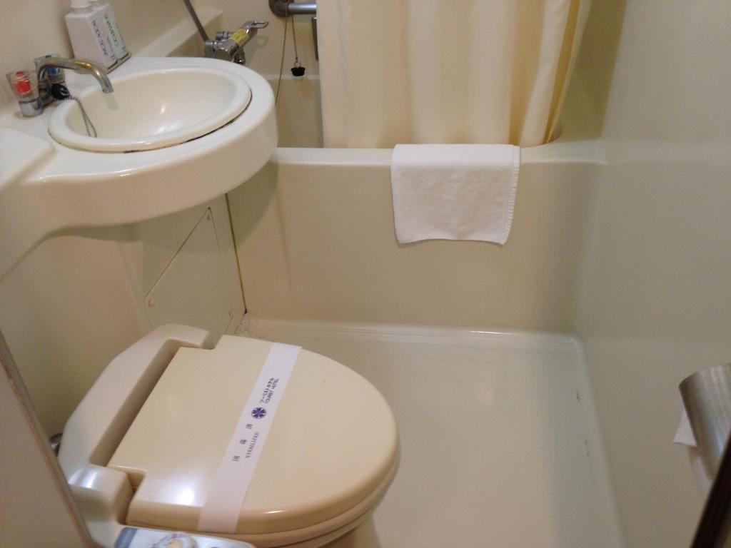 Tourist Hotel Tokio Habitación foto