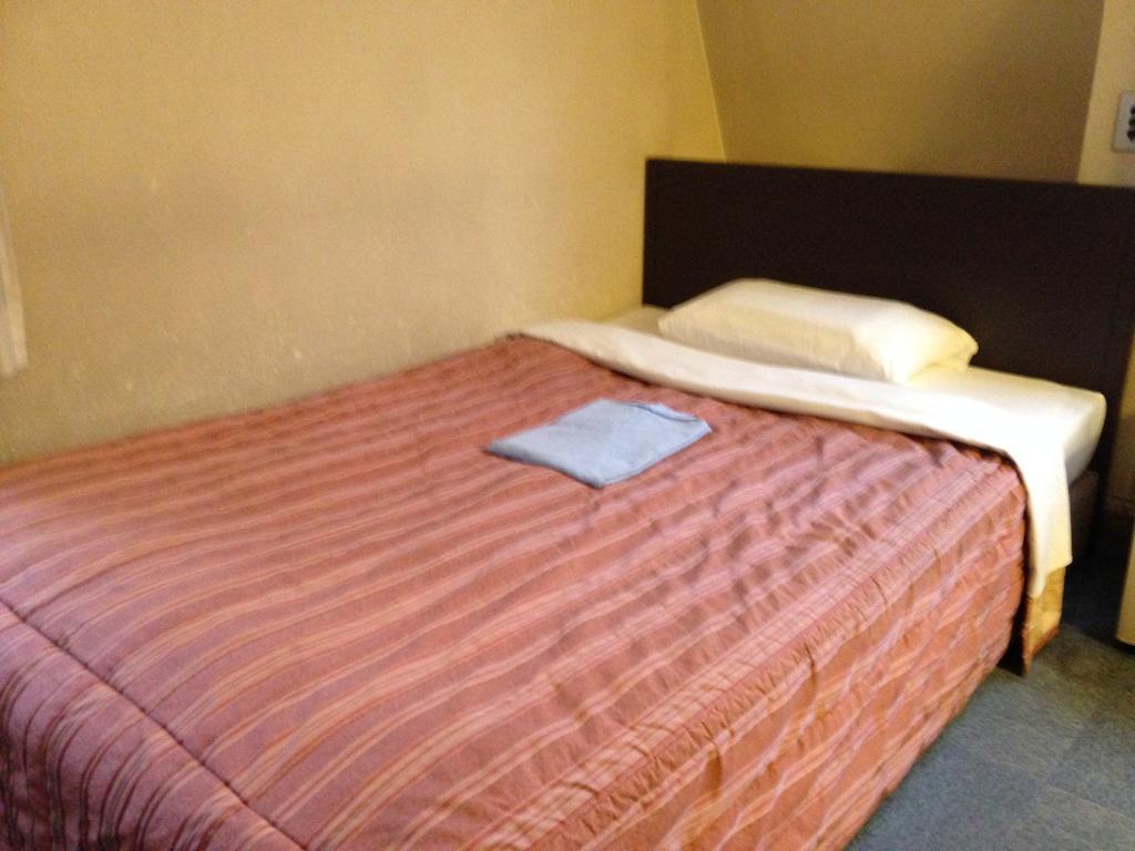 Tourist Hotel Tokio Habitación foto