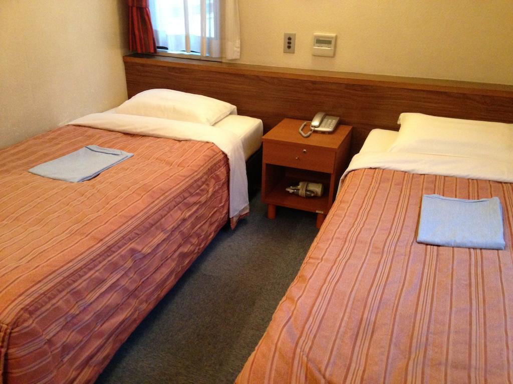 Tourist Hotel Tokio Habitación foto